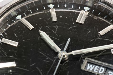 scratched watch bezel repair